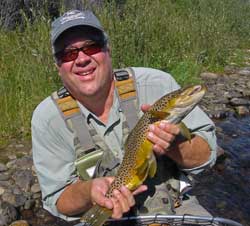 Holding a big trout!
